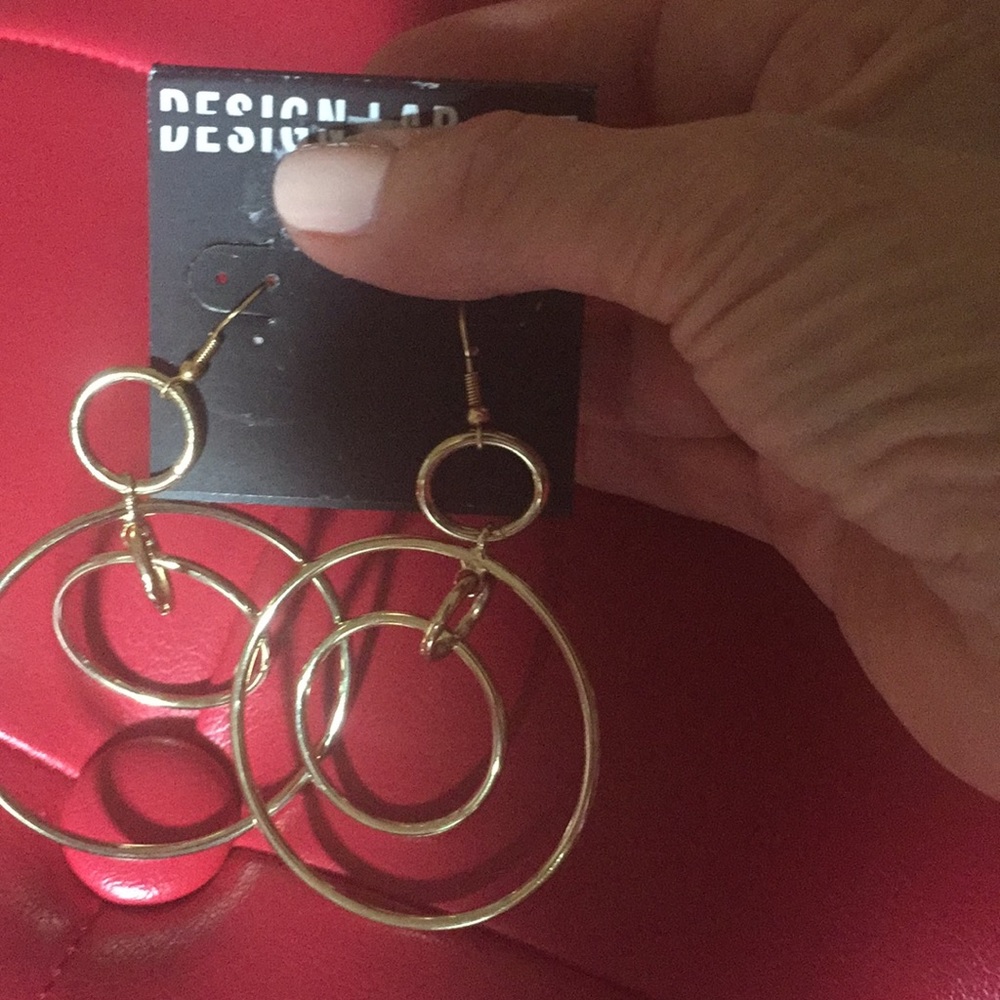 Design labs brand new earrings never worn from